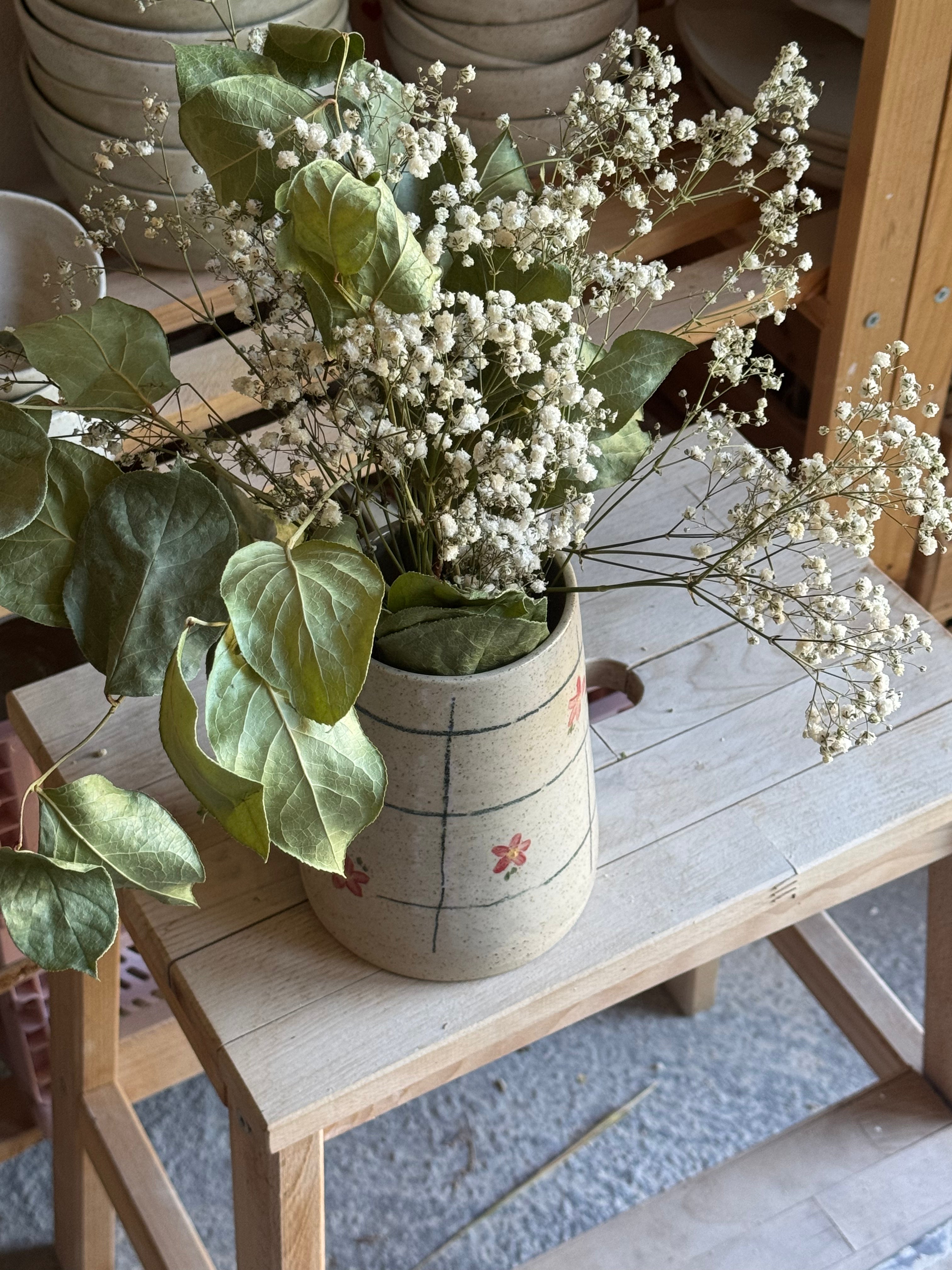 Vase à la montagne fleurs
